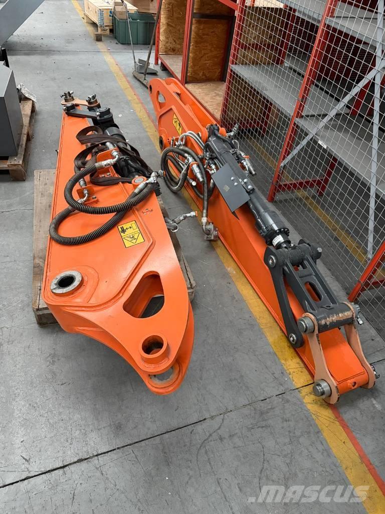 Develon DX 100 W-7 Kolesové rýpadlá