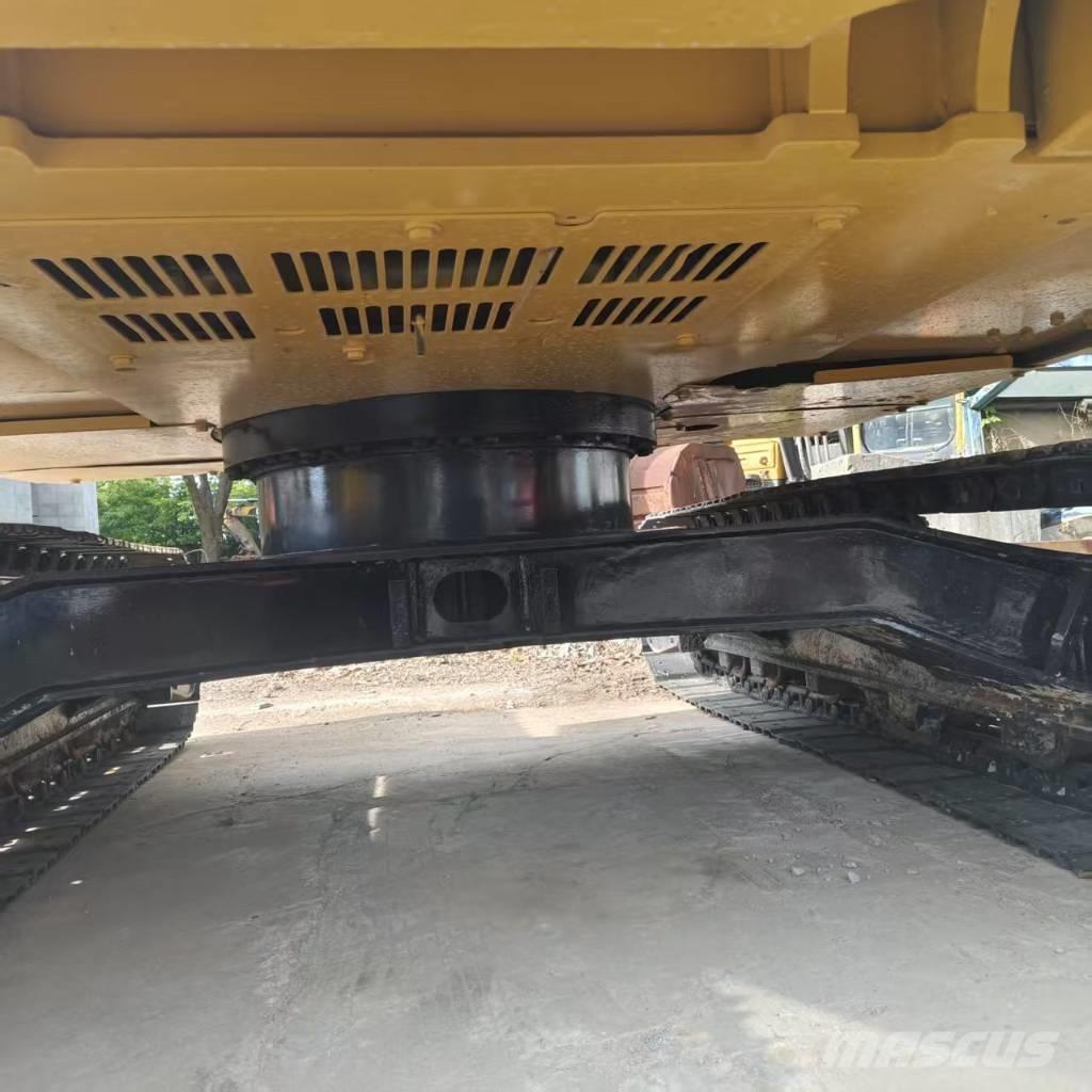 CAT 310 Pásové rýpadlá