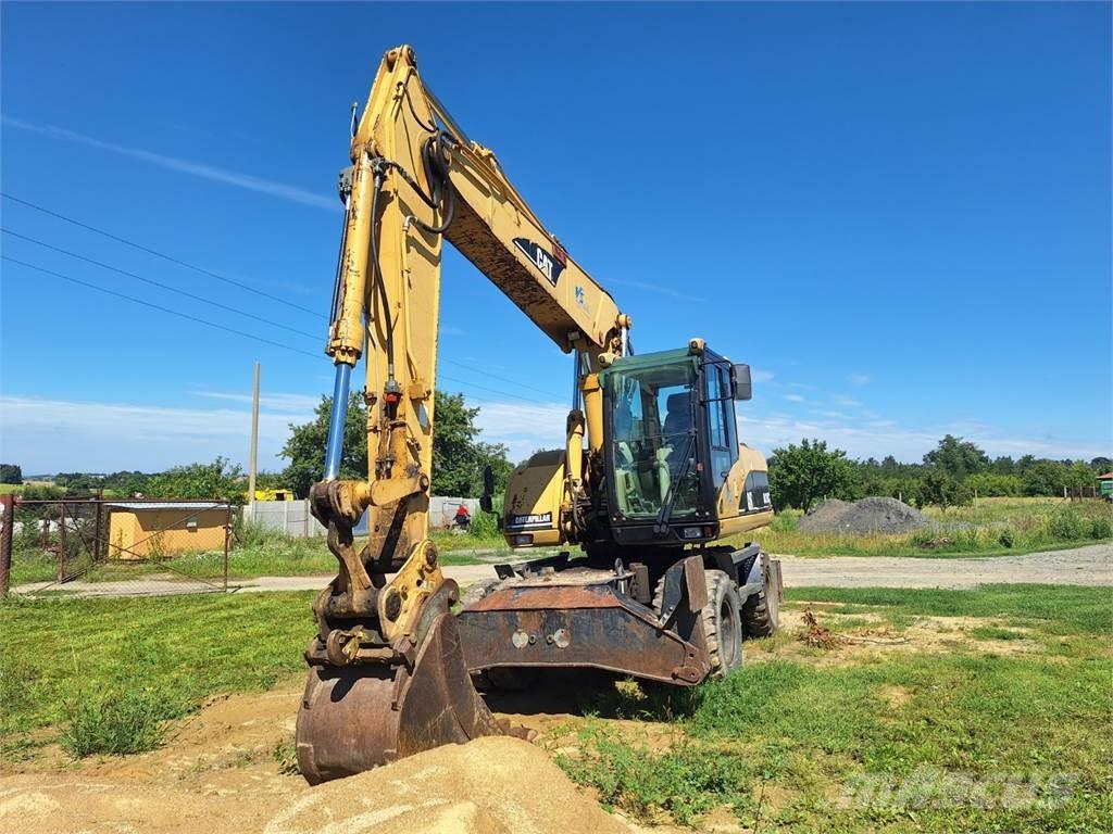 CAT M 318 C 4X4 Stavebníctvo - ostatné