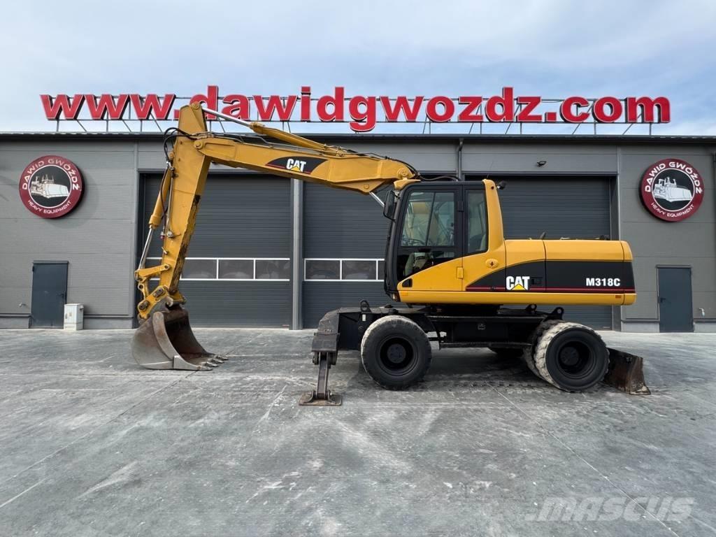 CAT M 318 C Kolesové rýpadlá