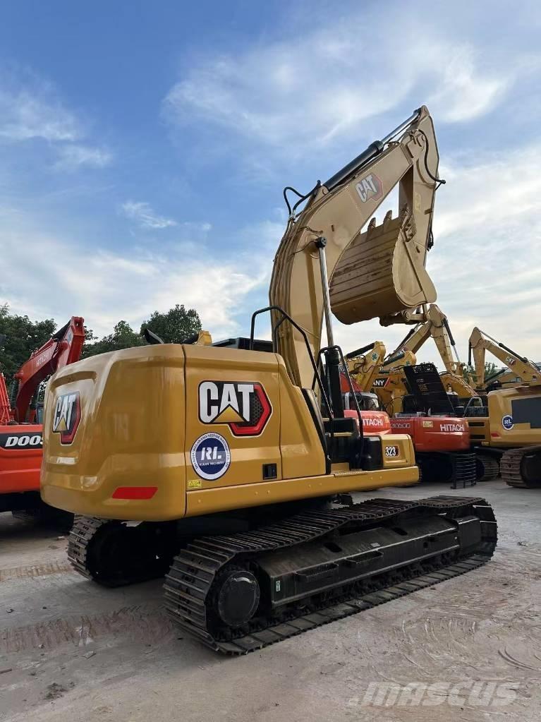 CAT 323 Pásové rýpadlá