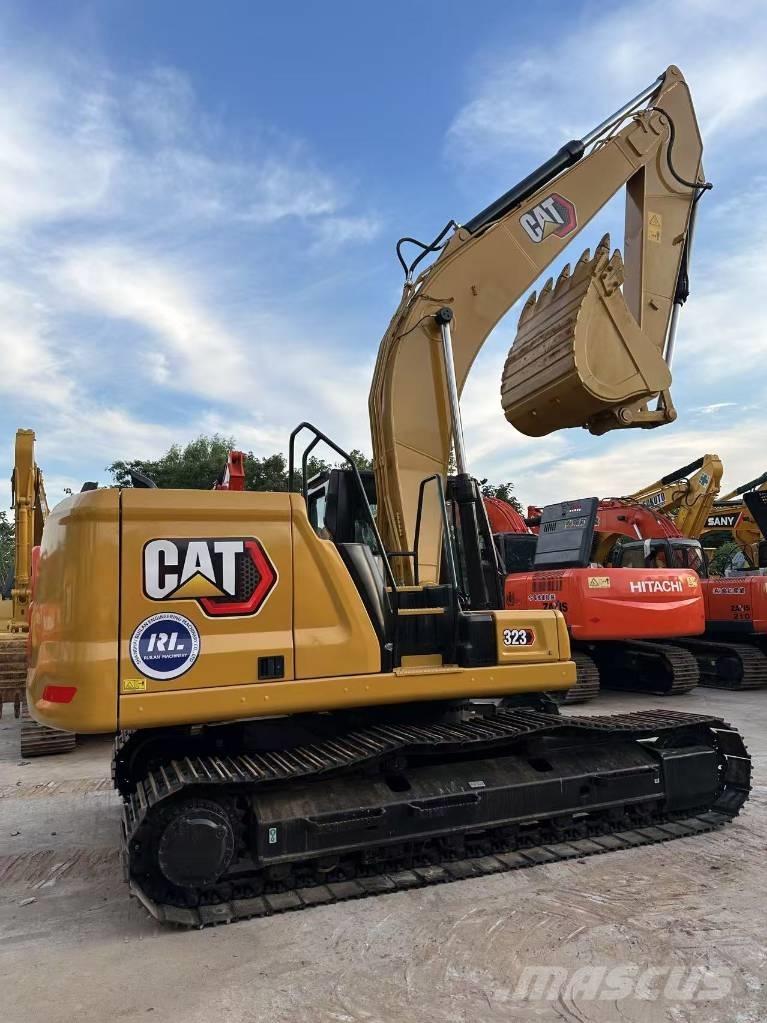 CAT 323 Pásové rýpadlá