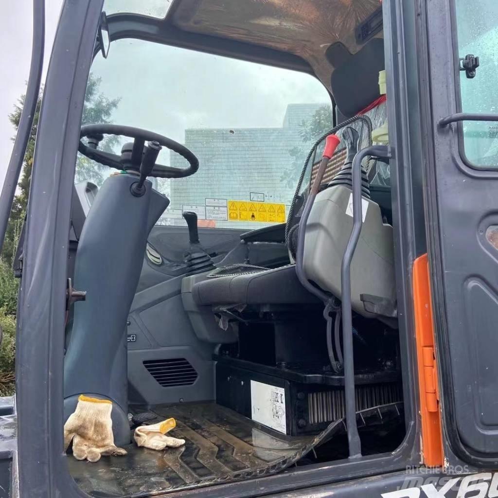 Doosan DX60W Kolesové rýpadlá
