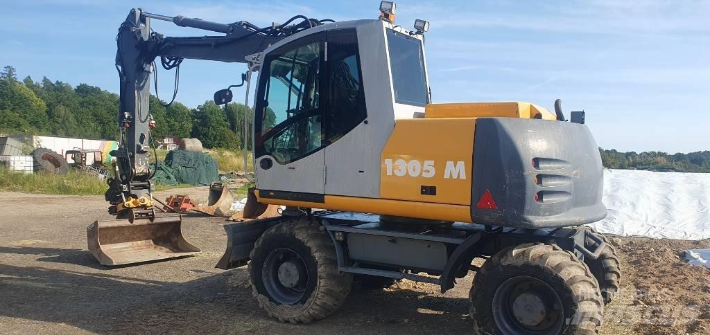 Atlas 1305 M Kolesové rýpadlá