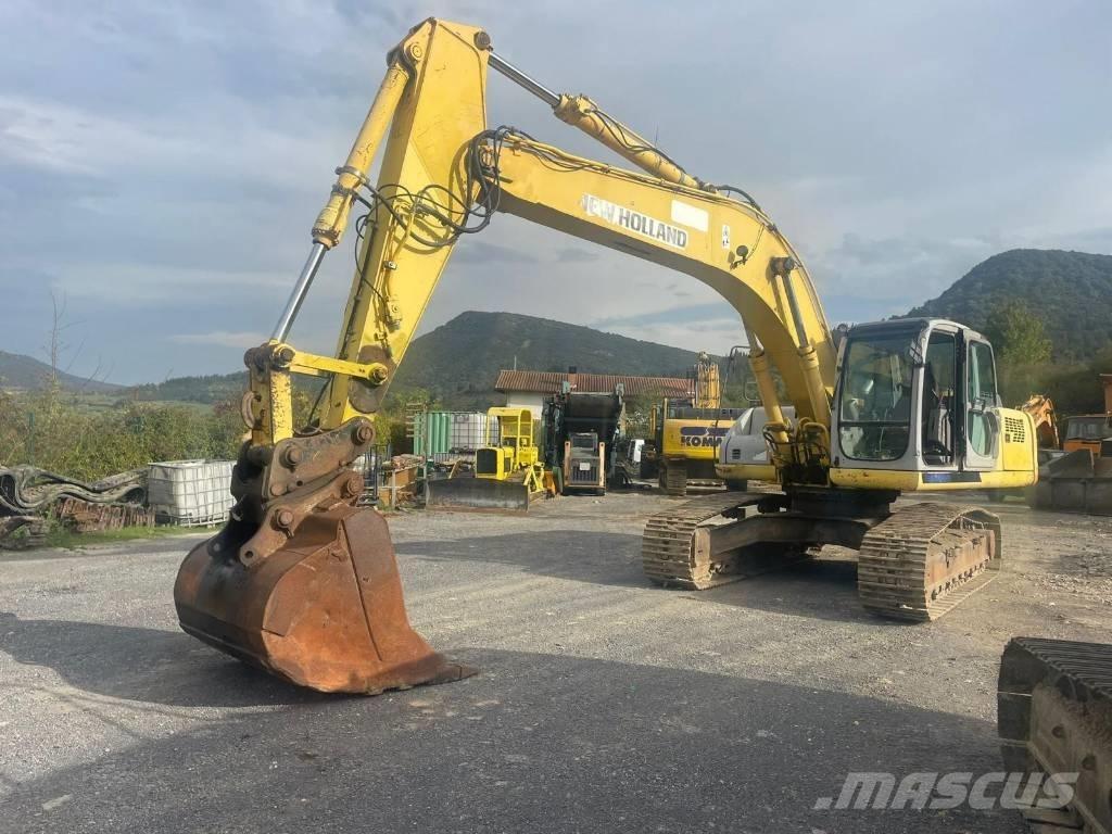 New Holland E 305 Pásové rýpadlá