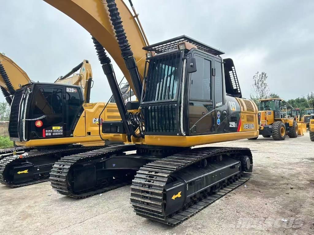 CAT 329 Pásové rýpadlá