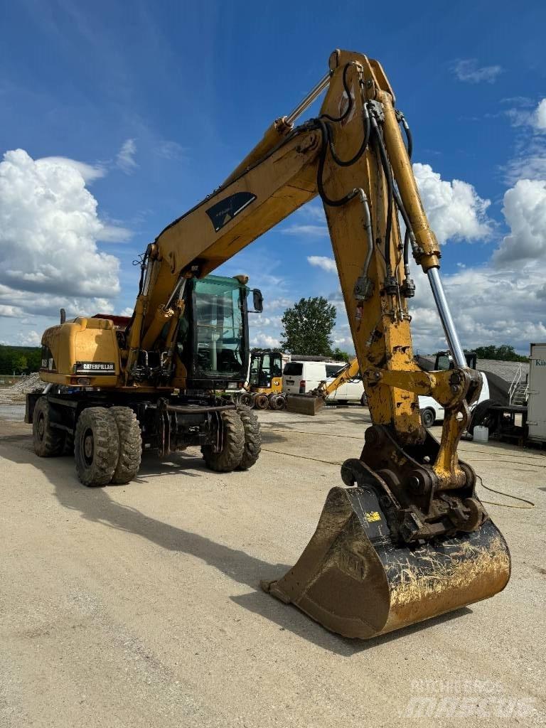CAT 315 C Kolesové rýpadlá