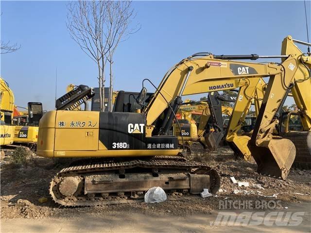 CAT 318D Pásové rýpadlá