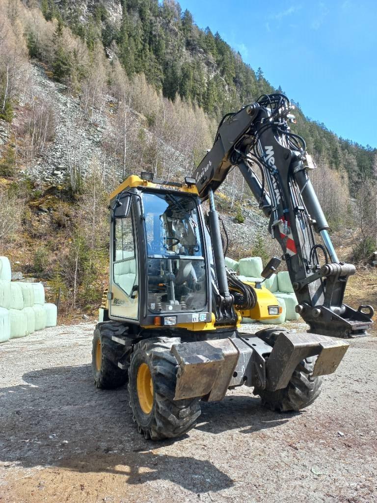 Mecalac 12 M XT Rýpadlo-nakladače