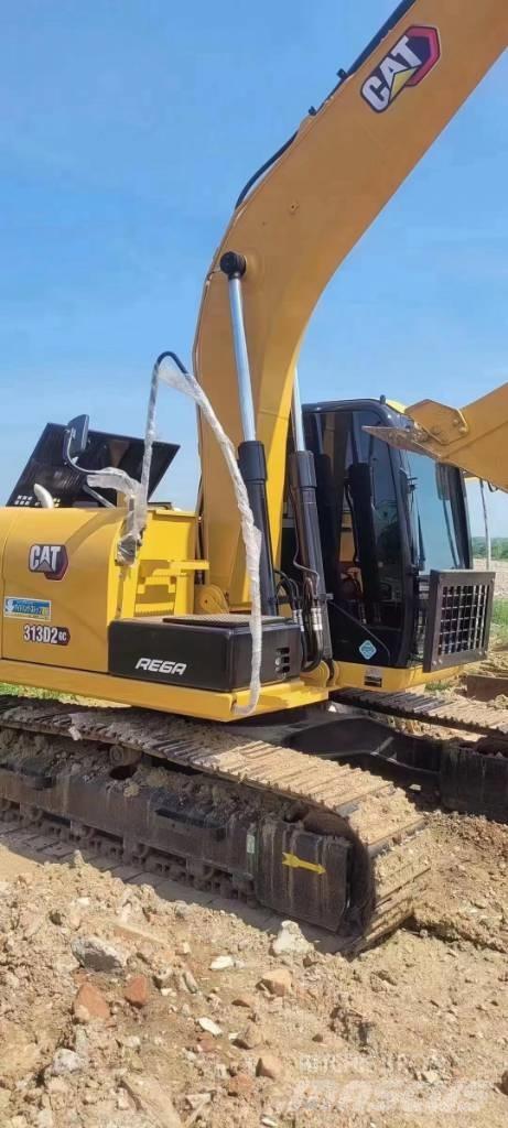 CAT 313D2GC Pásové rýpadlá