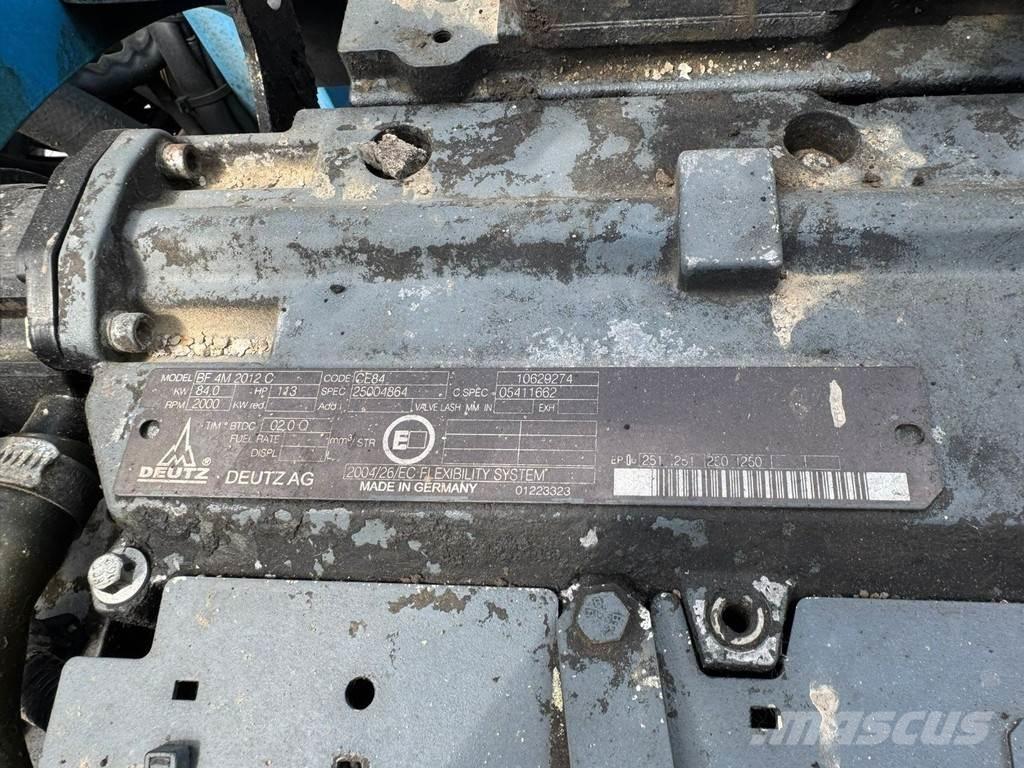 Fuchs MHL 320 Stroje pre manipuláciu s odpadom