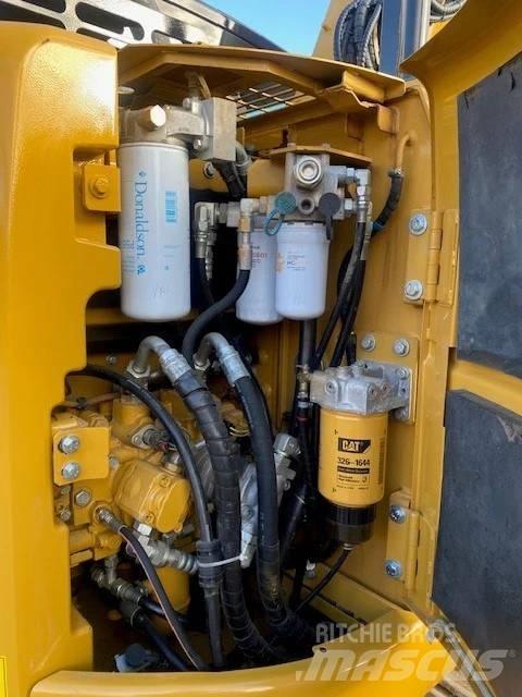 CAT 313 Pásové rýpadlá