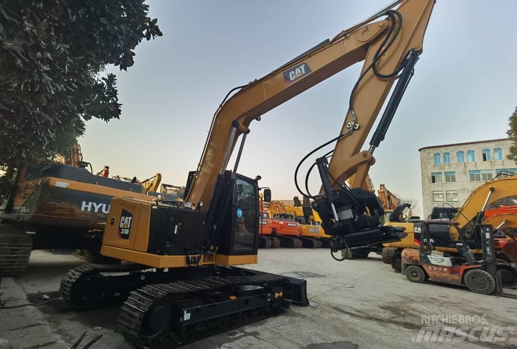 CAT 310 Pásové rýpadlá
