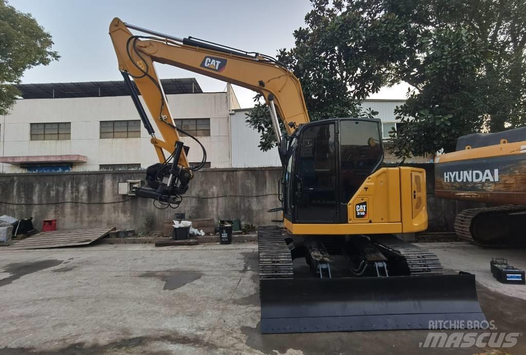 CAT 310 Pásové rýpadlá