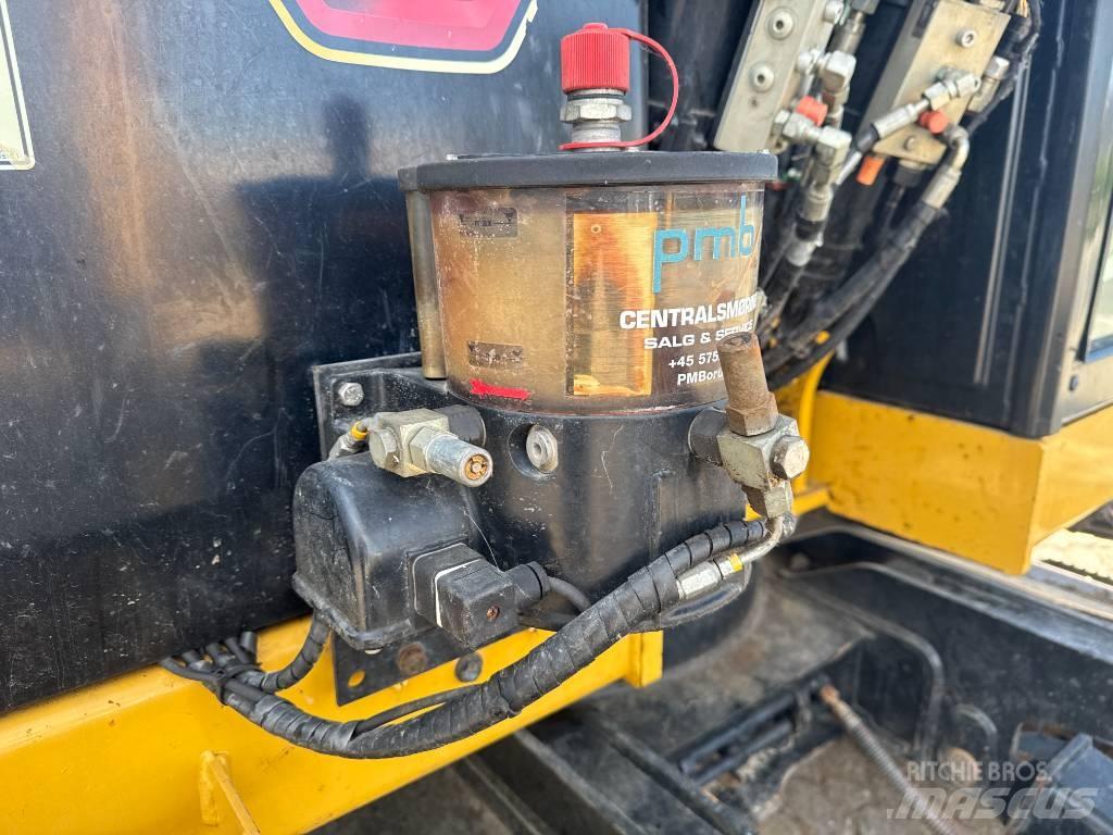 CAT 310 Pásové rýpadlá