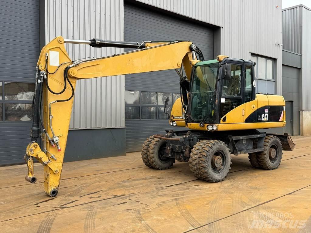 CAT M315D Kolesové rýpadlá