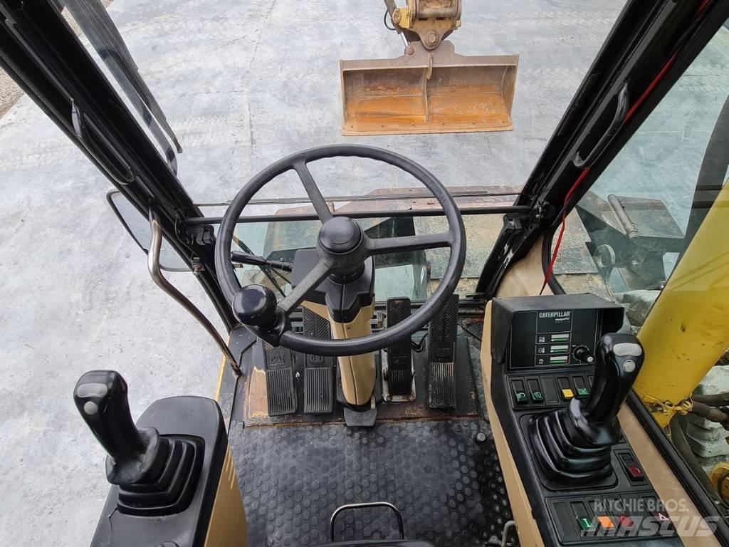 CAT M 312 Kolesové rýpadlá