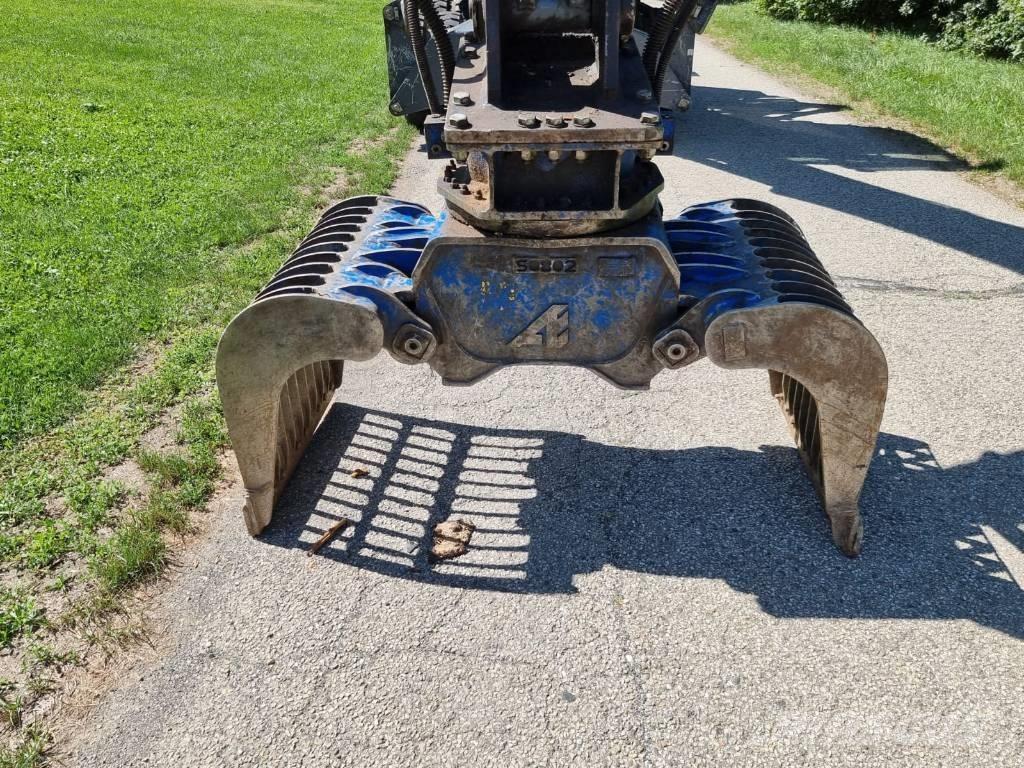 Fuchs MHL 250 Stroje pre manipuláciu s odpadom
