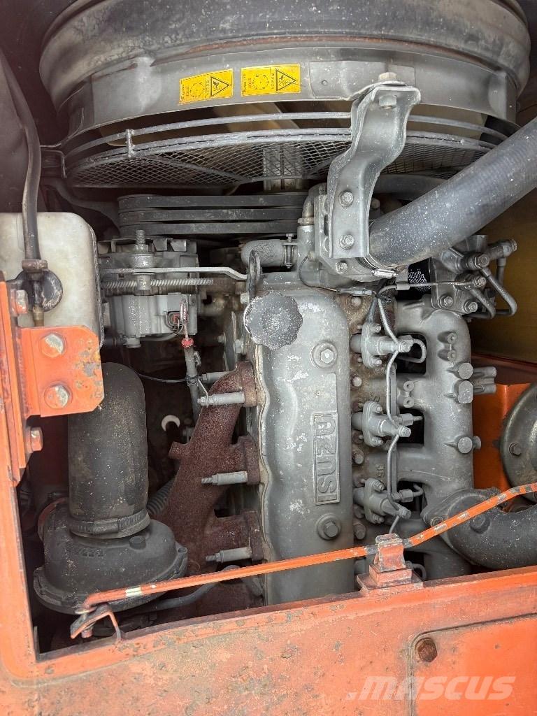 Hitachi EG 70 R Pásové sklápače