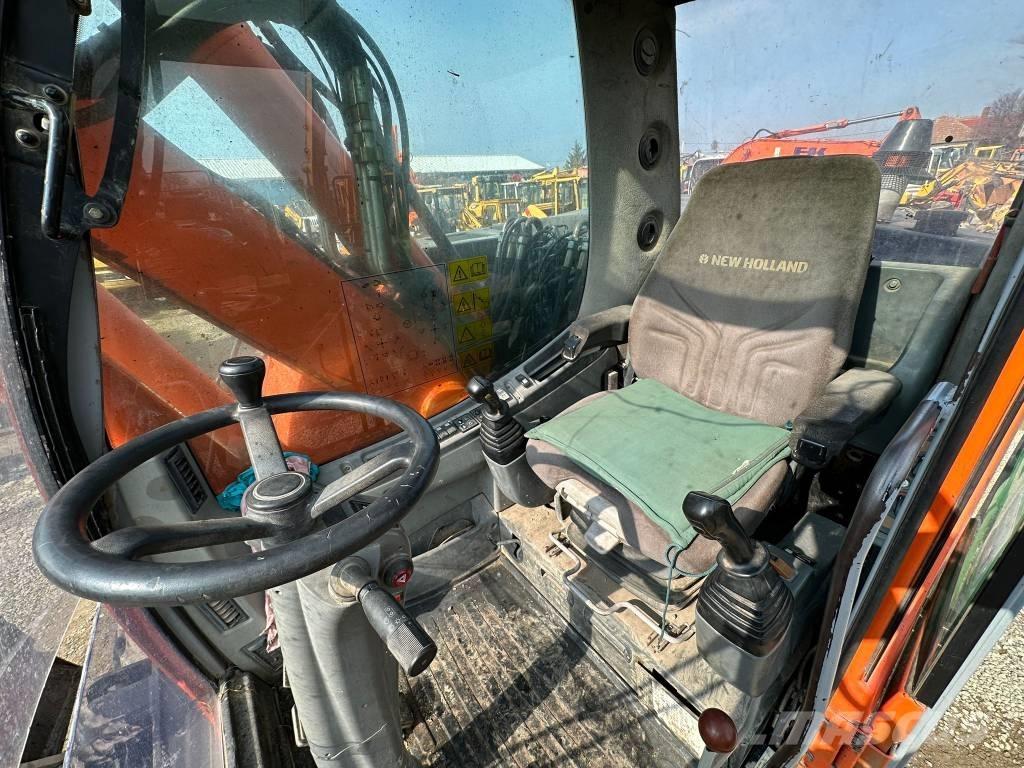 New Holland MH Plus Kolesové rýpadlá