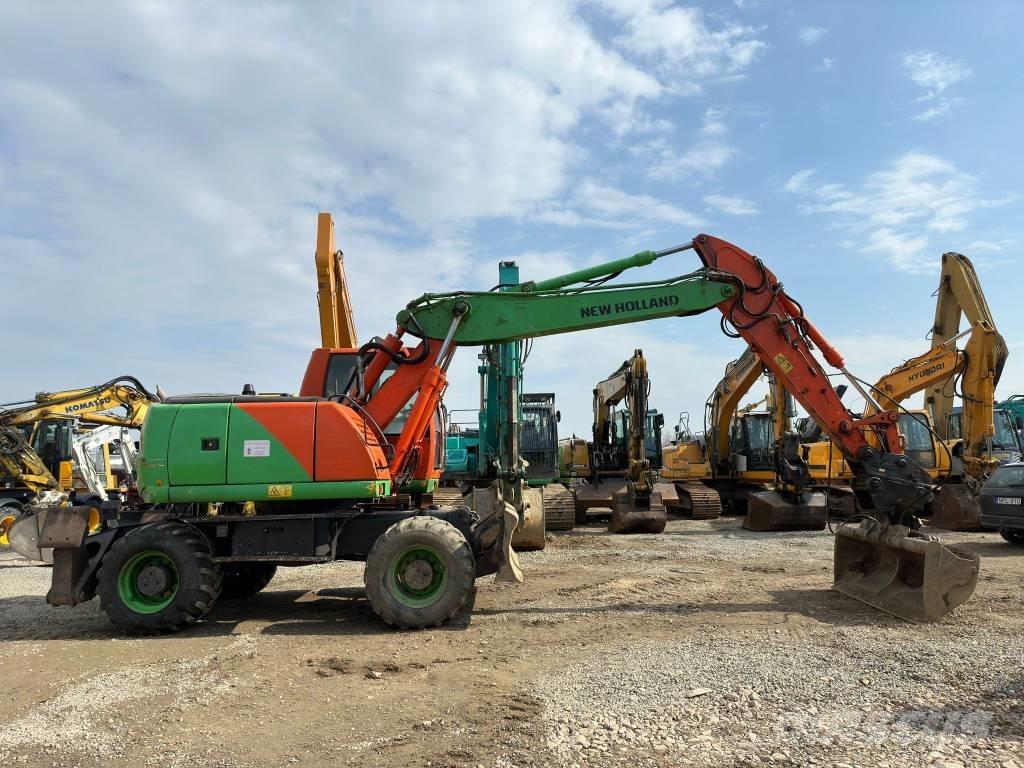 New Holland MH Plus Kolesové rýpadlá