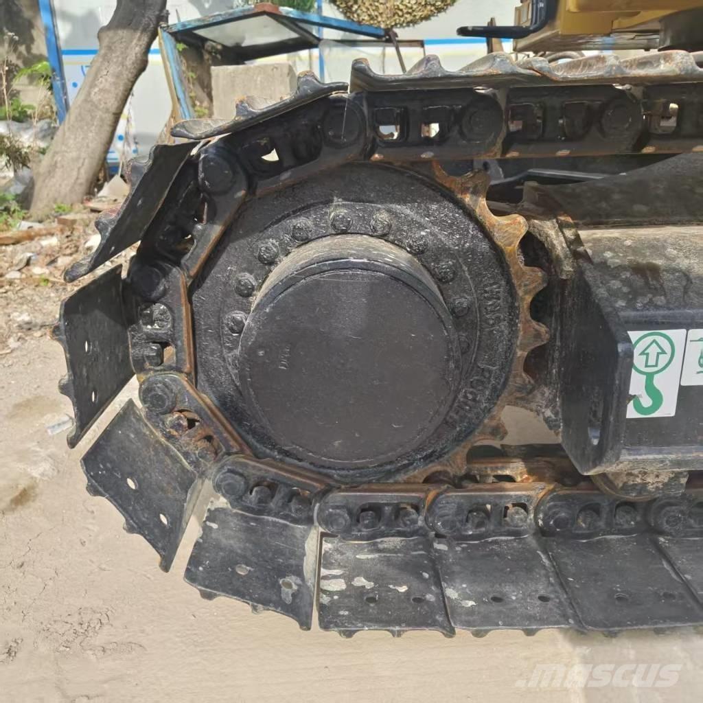CAT 310 Pásové rýpadlá