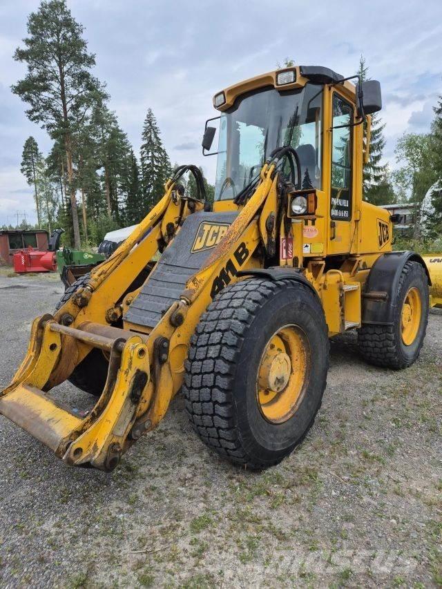 JCB 411B Kolesové nakladače