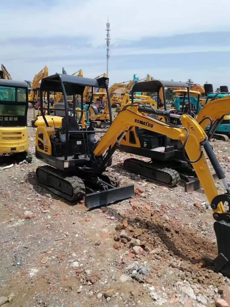 Komatsu PC18 Pásové rýpadlá