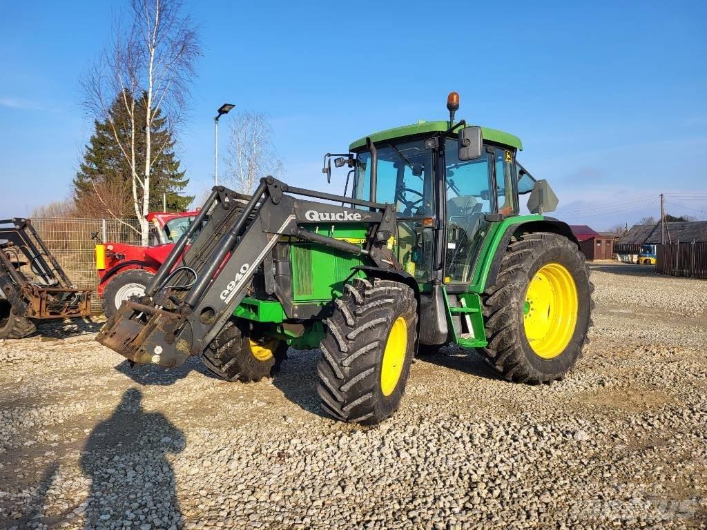 John Deere 6310 SE Traktory