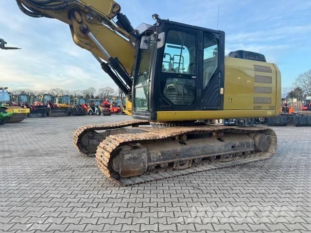 CAT 323 EL Pásové rýpadlá