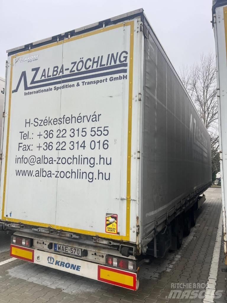 Krone MEGA Prívesy s bočnou zhrnovacou plachtou