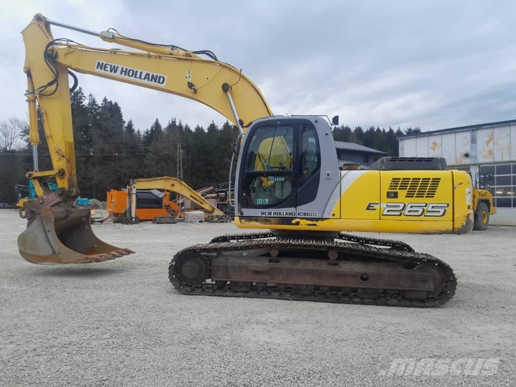 New Holland E 265 Pásové rýpadlá