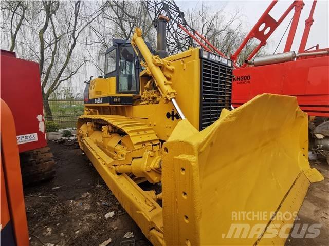 Komatsu D155A Pásové dozéry