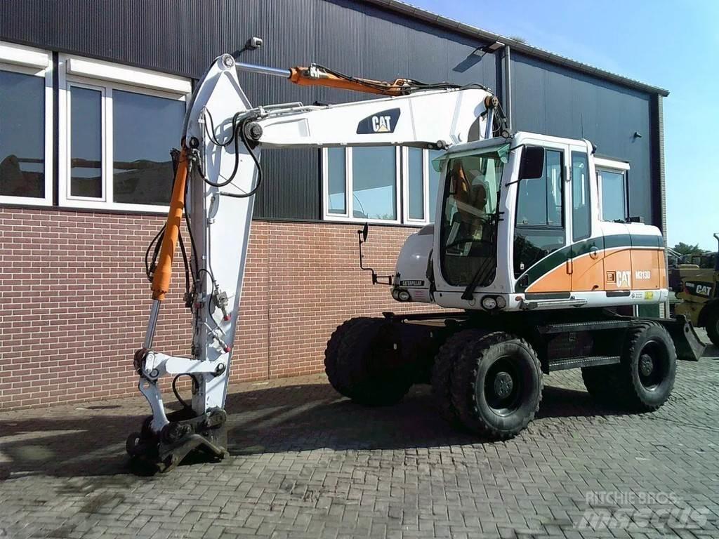 CAT M313D Kolesové rýpadlá