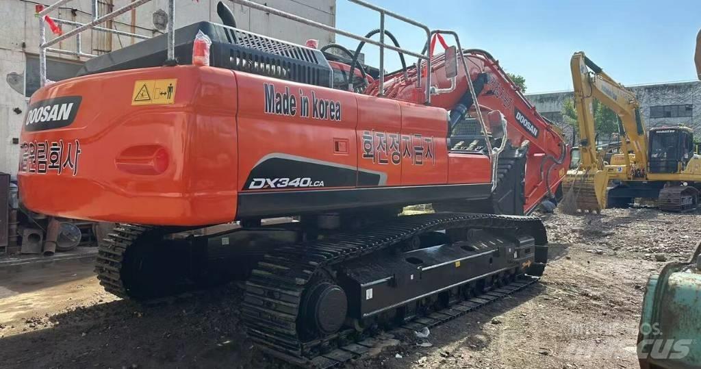 Doosan DX340 Pásové rýpadlá