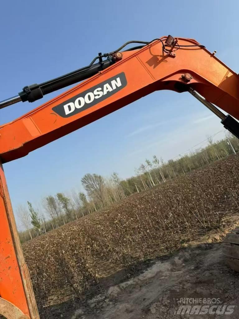 Doosan DX 75-9 C Pásové rýpadlá