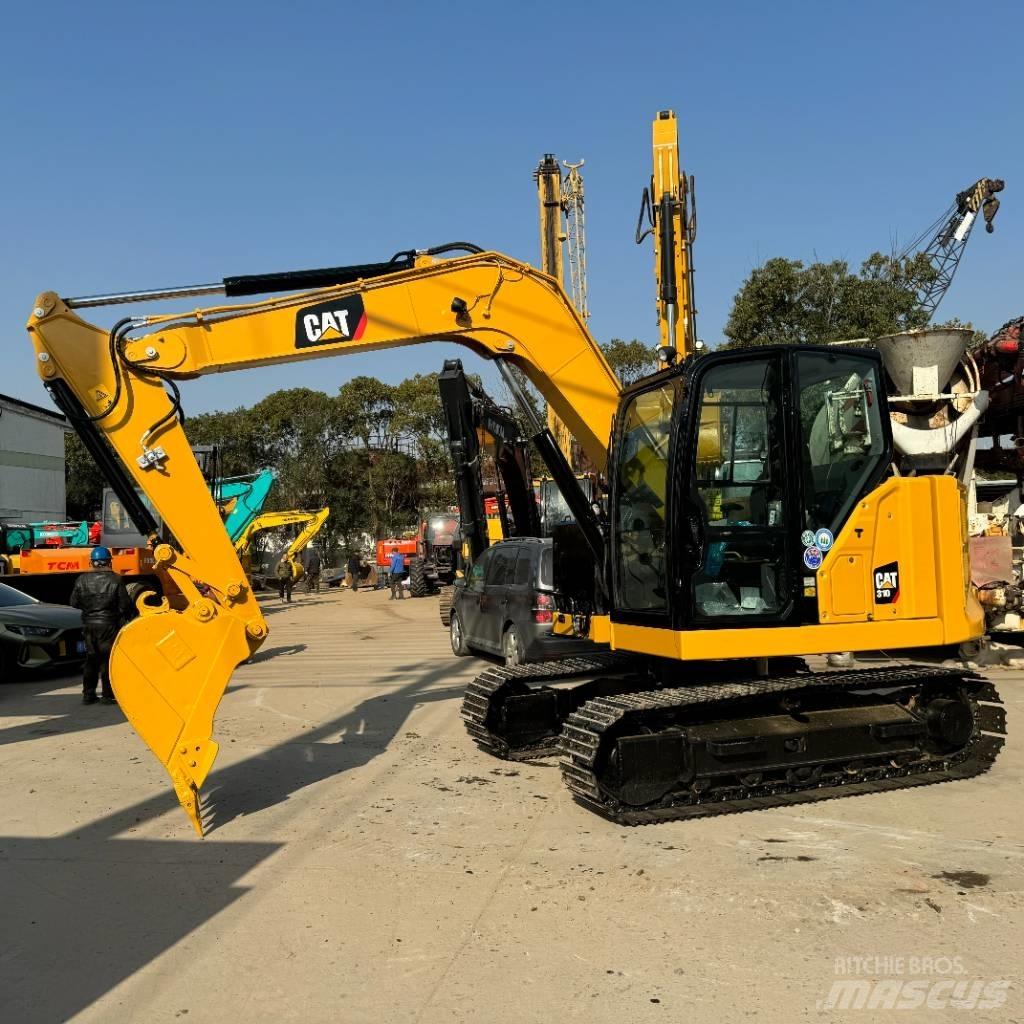 CAT 310 Pásové rýpadlá