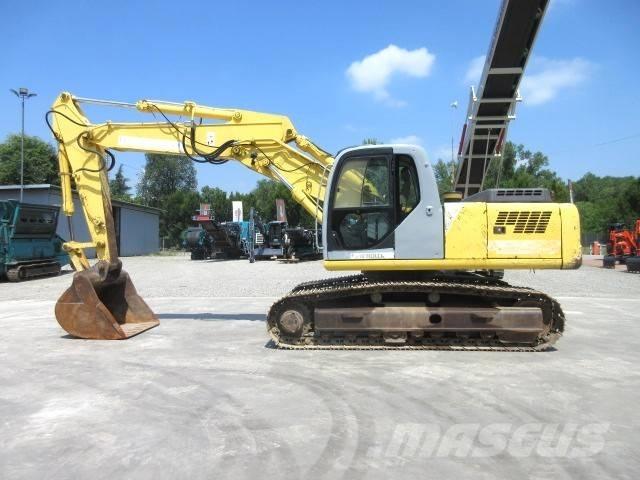 New Holland E 245 Pásové rýpadlá