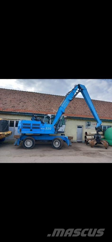 Fuchs MHL 320 Kolesové rýpadlá