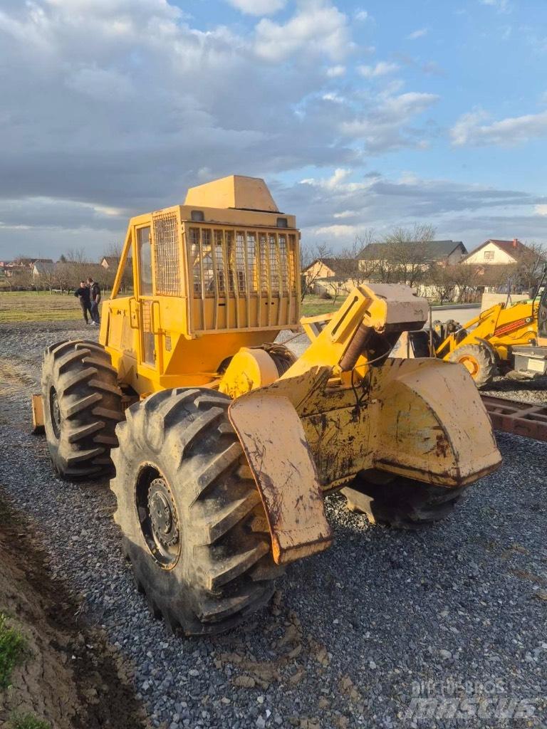 John Deere 667d Lesné traktory