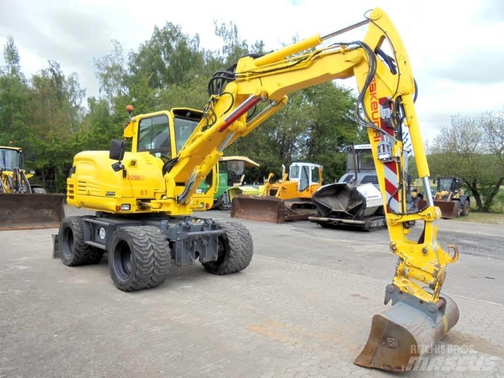 Takeuchi TB 295 W-2 Kolesové rýpadlá