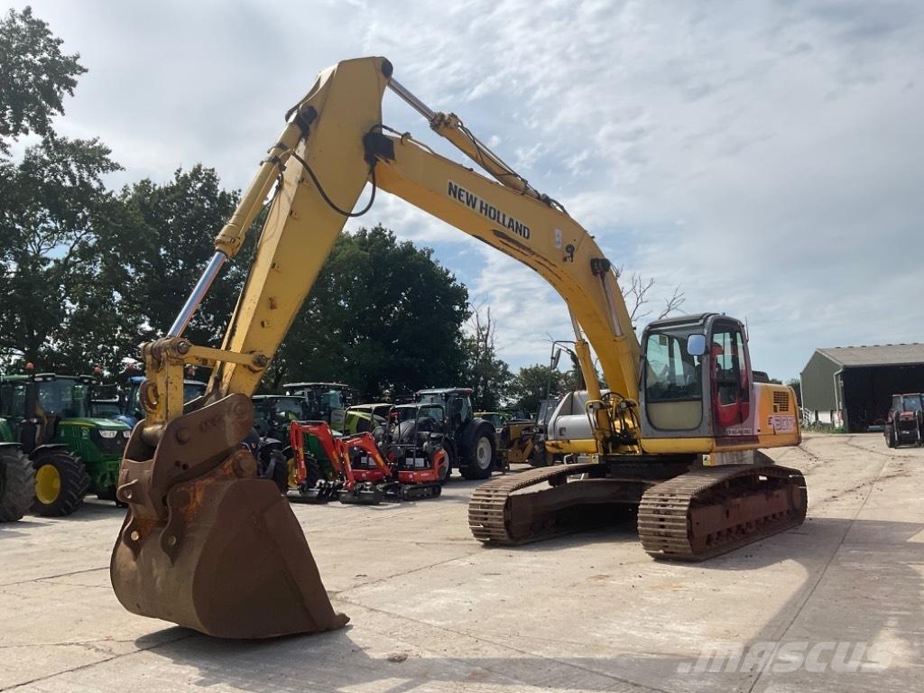 New Holland E 305 Pásové rýpadlá