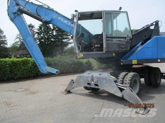 Fuchs MHL 320 Stroje pre manipuláciu s odpadom