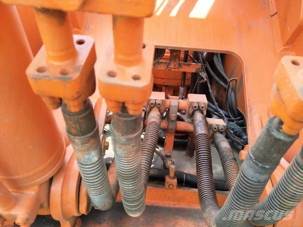 Doosan 225 Pásové rýpadlá