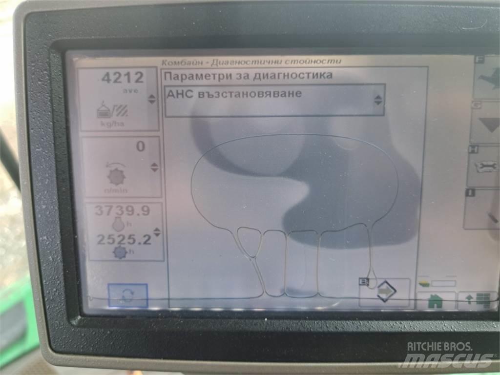 John Deere W650 Kombinované zberacie stroje