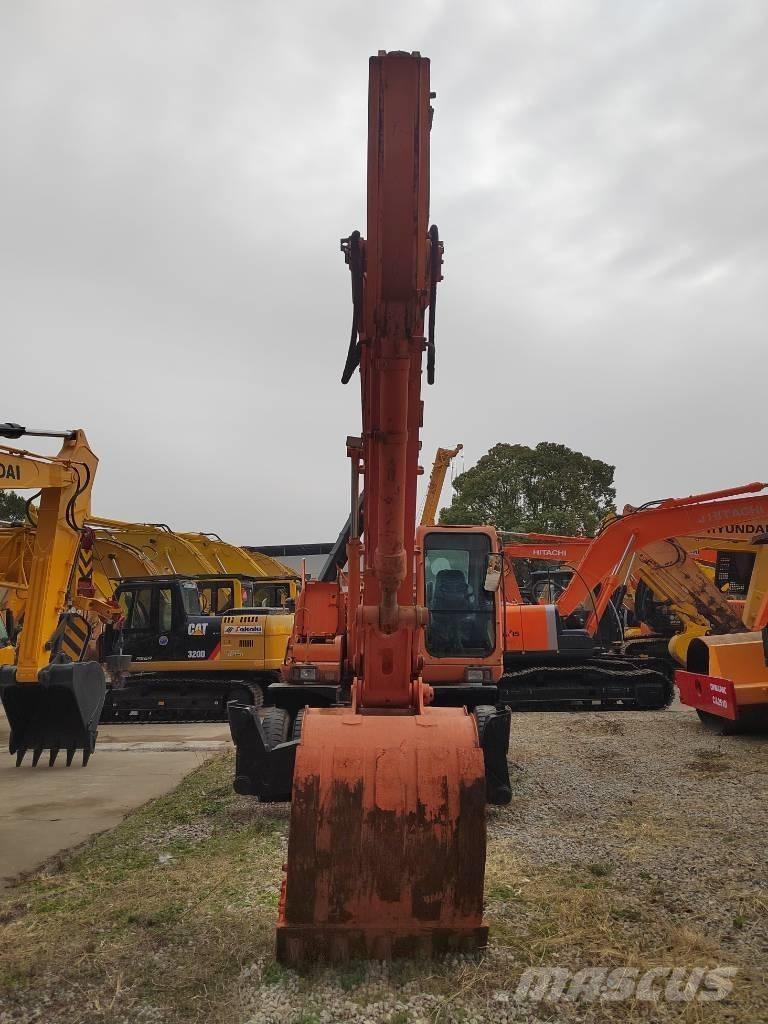 Doosan DH 210 W-7 Kolesové rýpadlá