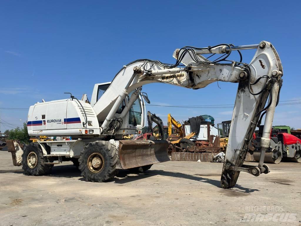 New Holland MH Plus Kolesové rýpadlá