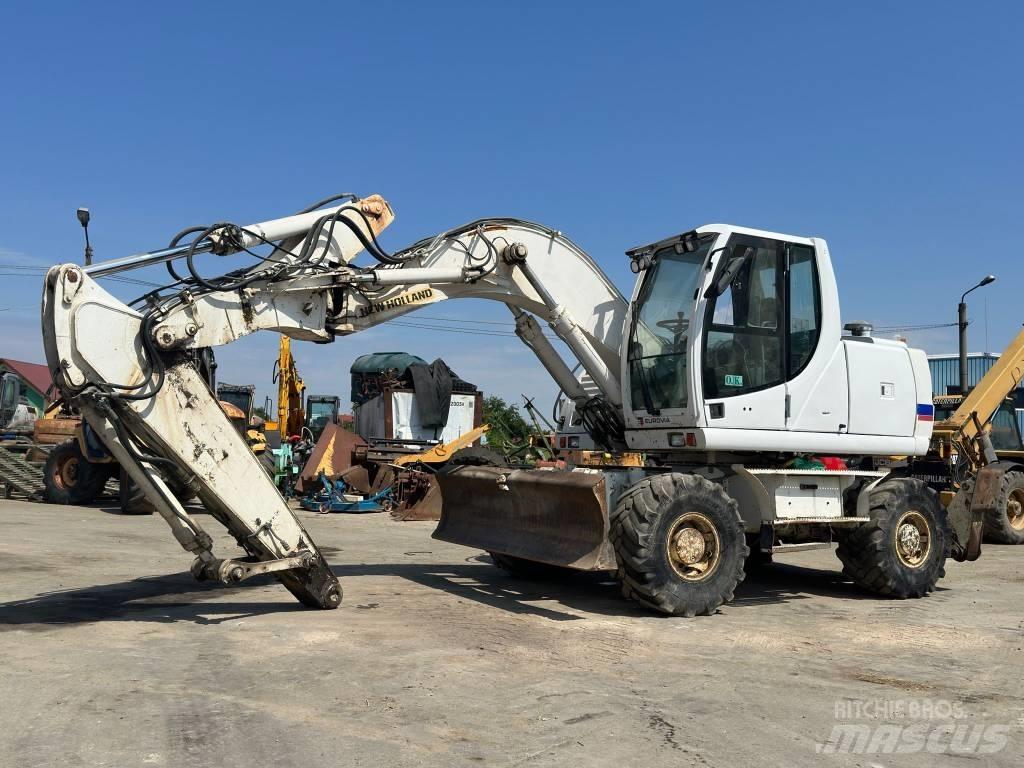 New Holland MH Plus Kolesové rýpadlá