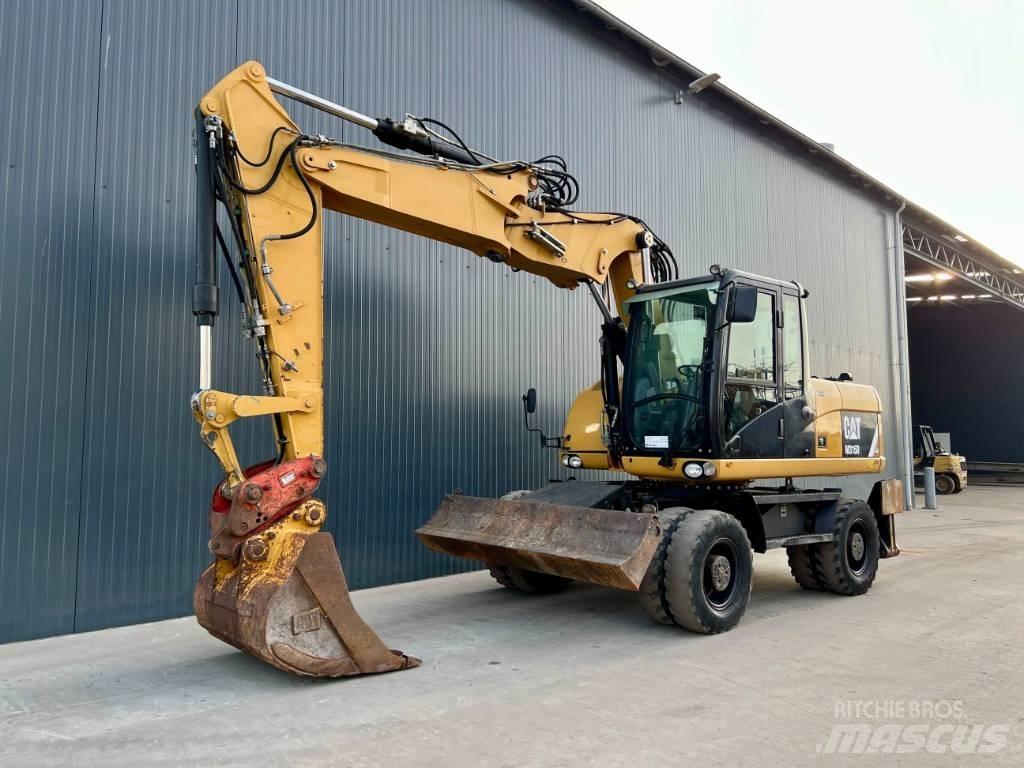 CAT M315D Kolesové rýpadlá