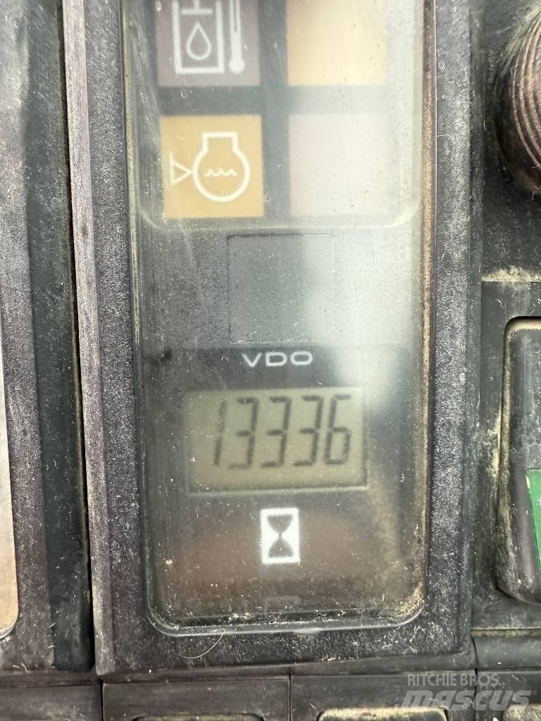 Fuchs MHL 331 Stroje pre manipuláciu s odpadom